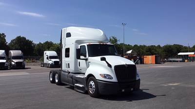 International LT Sleeper Semi Truck - 73" Raised Roof, Cummins, Automatic, Battery Powered HVAC with Optimized Idle