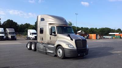 International LT Sleeper Semi Truck - 73" Raised Roof, Cummins, Automatic, Battery Powered HVAC with Optimized Idle
