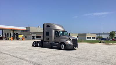 International LT Sleeper Semi Truck - 73" Raised Roof, Cummins, Automatic, Battery Powered HVAC with Optimized Idle