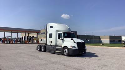 International LT Sleeper Semi Truck - 73" Raised Roof, Cummins, Automatic, Battery Powered HVAC with Optimized Idle