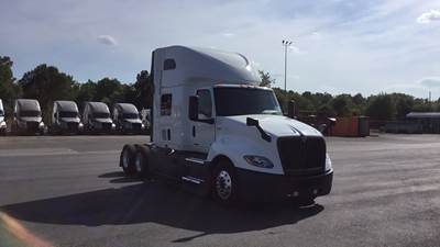 International LT Sleeper Semi Truck - 73" Raised Roof, Cummins, Automatic, Battery Powered HVAC with Optimized Idle