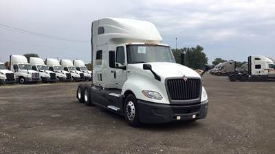 International LT Sleeper Semi Truck - 73" Raised Roof, Cummins, Automatic, Battery Powered HVAC with Optimized Idle