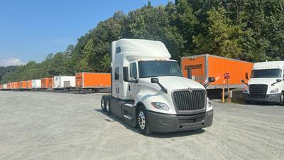 International LT Sleeper Semi Truck - 73" Raised Roof, Cummins, Automatic, Battery Powered HVAC with Optimized Idle