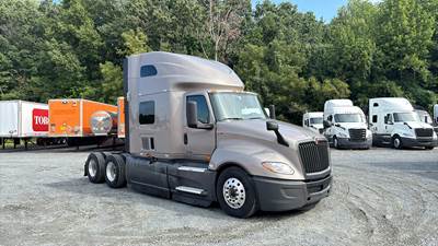 International LT Sleeper Semi Truck - 73" Raised Roof, Cummins, Automatic, Battery Powered HVAC with Optimized Idle