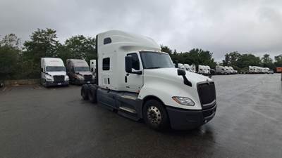 International LT Sleeper Semi Truck - 73" Raised Roof, Cummins, Automatic, Battery Powered HVAC with Optimized Idle