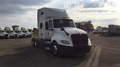 International LT Sleeper Semi Truck - 73" Raised Roof, Cummins, Automatic, Battery Powered HVAC with Optimized Idle