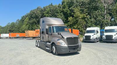 International LT Sleeper Semi Truck - 73" Raised Roof, Cummins, Automatic, Battery Powered HVAC with Optimized Idle