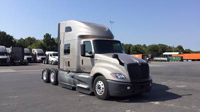 International LT Sleeper Semi Truck - 73" Raised Roof, Cummins, Automatic, Battery Powered HVAC with Optimized Idle
