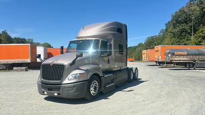 International LT Sleeper Semi Truck - 73" Raised Roof, Cummins, Automatic