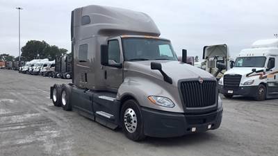 International LT Sleeper Semi Truck - 73" Raised Roof, Cummins, Automatic, Battery Powered HVAC with Optimized Idle