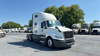 International LT Sleeper Semi Truck - 73" Raised Roof, Cummins, Automatic, Battery Powered HVAC with Optimized Idle