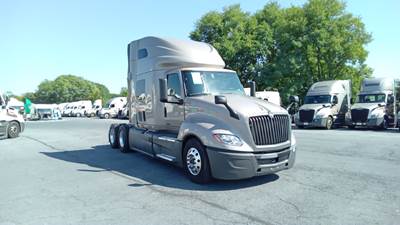 International LT Sleeper Semi Truck - 73" Raised Roof, Cummins, Automatic, Battery Powered HVAC with Optimized Idle