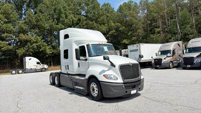 International LT Sleeper Semi Truck - 73" Raised Roof, Cummins, Automatic, Battery Powered HVAC with Optimized Idle