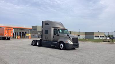 International LT Sleeper Semi Truck - 73" Raised Roof, Cummins, Automatic, Battery Powered HVAC with Optimized Idle