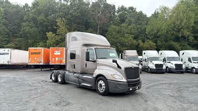 International LT Sleeper Semi Truck - 73" Raised Roof, Cummins, Automatic, Battery Powered HVAC with Optimized Idle