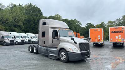 International LT Sleeper Semi Truck - 73" Raised Roof, Cummins, Automatic, Battery Powered HVAC with Optimized Idle