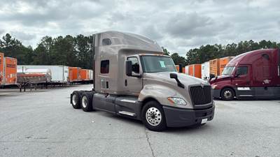 International LT Sleeper Semi Truck - 73" Raised Roof, Cummins, Automatic, Battery Powered HVAC with Optimized Idle