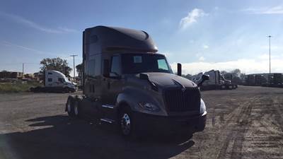 International LT Sleeper Semi Truck - 73" Raised Roof, Cummins, Automatic, Battery Powered HVAC with Optimized Idle