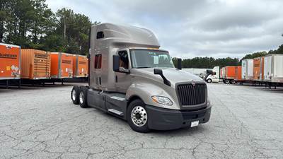 International LT Sleeper Semi Truck - 73" Raised Roof, Cummins, Automatic, Battery Powered HVAC with Optimized Idle