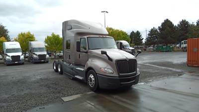 International LT Sleeper Semi Truck - 73" Raised Roof, Cummins, Automatic, Battery Powered HVAC with Optimized Idle