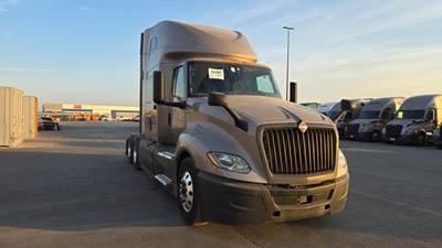 International LT Sleeper Semi Truck - 73" Raised Roof, Cummins, Automatic, Battery Powered HVAC with Optimized Idle