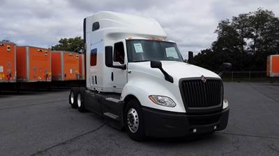 International LT Sleeper Semi Truck - 73" Raised Roof, Cummins, Automatic, Battery Powered HVAC with Optimized Idle