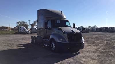International LT Sleeper Semi Truck - 73" Raised Roof, Cummins, Automatic, Battery Powered HVAC with Optimized Idle