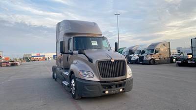 International LT Sleeper Semi Truck - 73" Raised Roof, Cummins, Automatic, Battery Powered HVAC with Optimized Idle