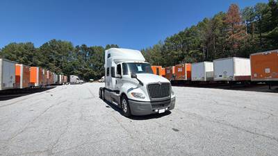 International LT Sleeper Semi Truck - 73" Raised Roof, Cummins, Automatic, Battery Powered HVAC with Optimized Idle