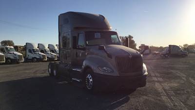 International LT Sleeper Semi Truck - 73" Raised Roof, Cummins, Automatic, Battery Powered HVAC W/ Optimized Idle