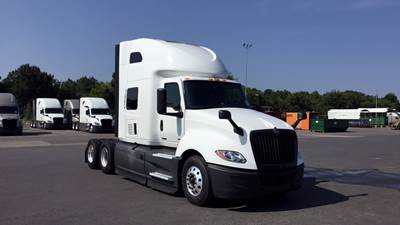 International LT625 Semi Truck - 73" Raised Roof Sleeper, A26, Automatic, Battery Powered HVAC with Optimized Idle
