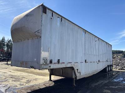 1991 Columbia Tri-Axle Possum Belly Chip Trailer