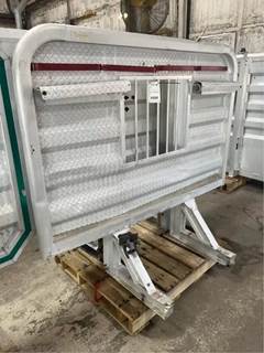 Used DayCab Cab Rack. Minor Damage. Center Barred Window (L-23"xW-27 3/8"). 2