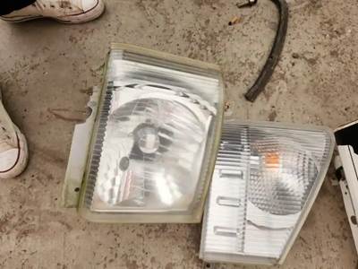 Isuzu NPR HD Headlight Assembly for a 2009 Isuzu NPR-HD