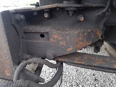 International 9900i Left Spring Hanger