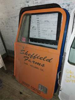 Freightliner FLD120T Classic Left Door for a Freightliner FLC120T CLASSIC