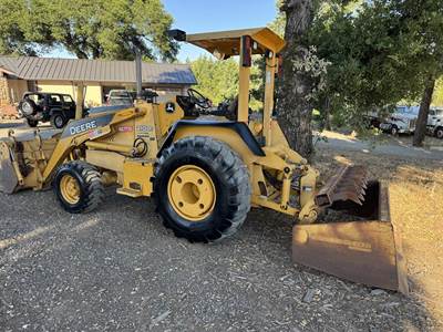 John Deere 210LE Skip Loader