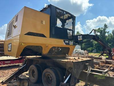Caterpillar 559C Trailer-Mounted Log Loader
