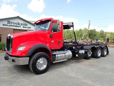 International HX Roll Off Truck
