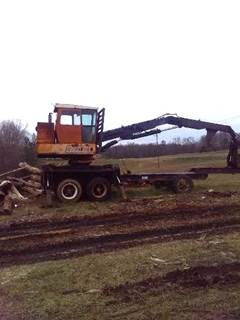 Precision Husky 235 Self Propelled Log Loader