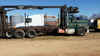 1993 Marmon Storm Debris Logging Truck
