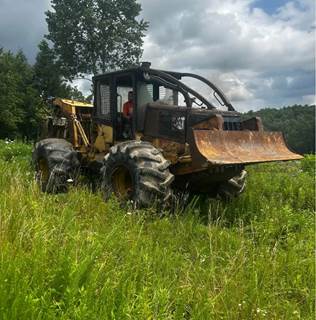 Caterpillar 515 Grapple/Cable Skidder