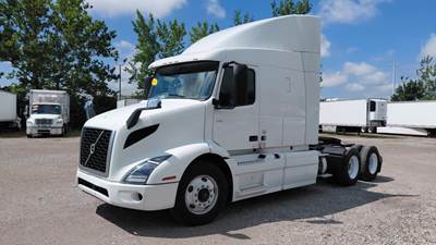 Volvo VNR64T-640 Sleeper Semi Truck - 60" Mid Roof Sleeper, 425HP, 12 Speed Automatic