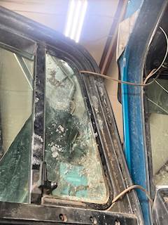 Freightliner FLD112 Door Vent Window for a 1997 Freightliner FLD112SD