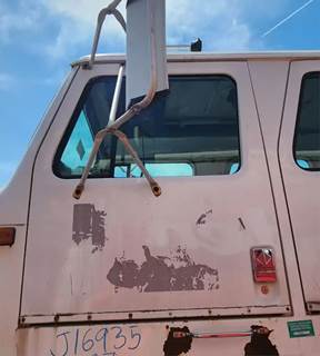 International F2554 Left Door for a 1997 International F-2554