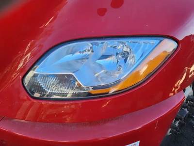 International LT625 Headlight Assembly