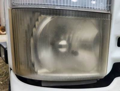 Isuzu NPR HD Headlight Assembly for a 2011 Isuzu NPR-HD