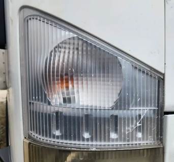 Isuzu NPR HD Headlight Assembly for a 2011 Isuzu NPR-HD