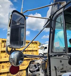 Freightliner FLD120SD Left Side View Mirror for a 2008 Freightliner FLD120SD Glider