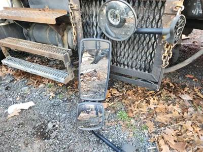 Freightliner M2 106 Left Side View Mirror for a 2010 Freightliner M2 106 Heavy Duty